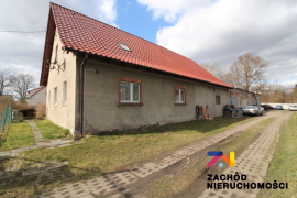 Dom wolnostojący z zabudowaniami o łącznej powierzchni zabudowy około 600m2